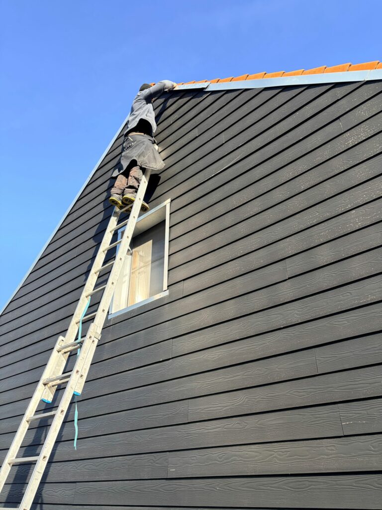 Bardage extérieur maison réalisé par couvreur à Lens